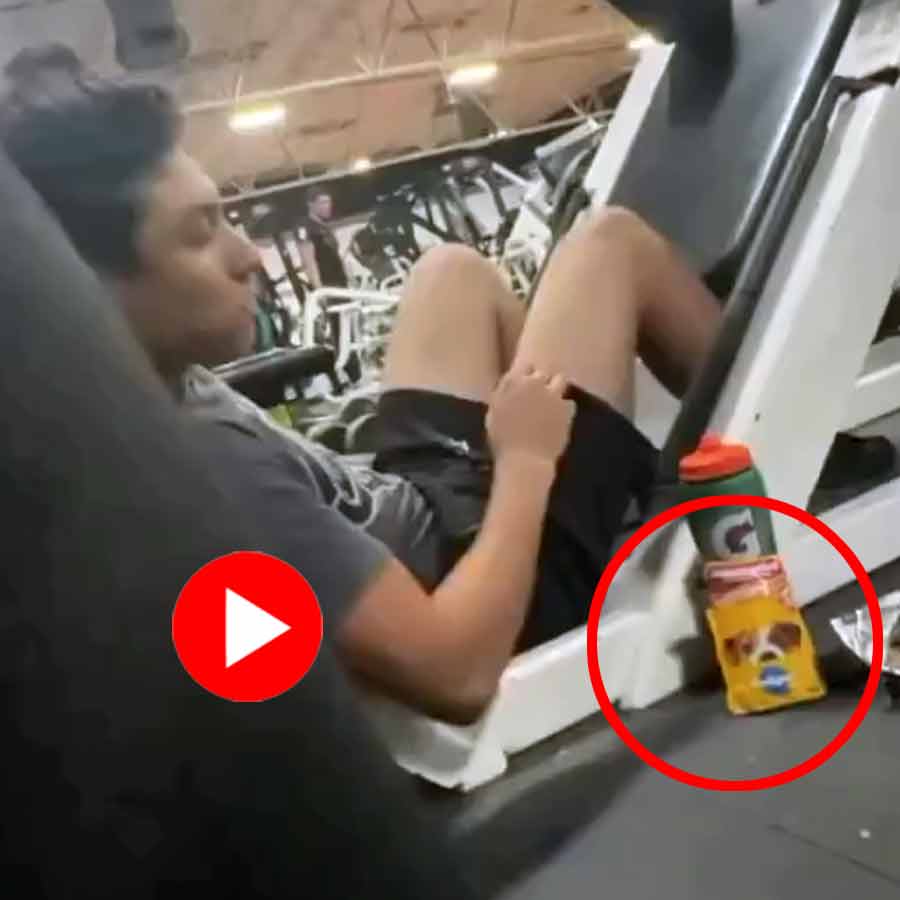 man was consuming a dog treat to boost his gym workout