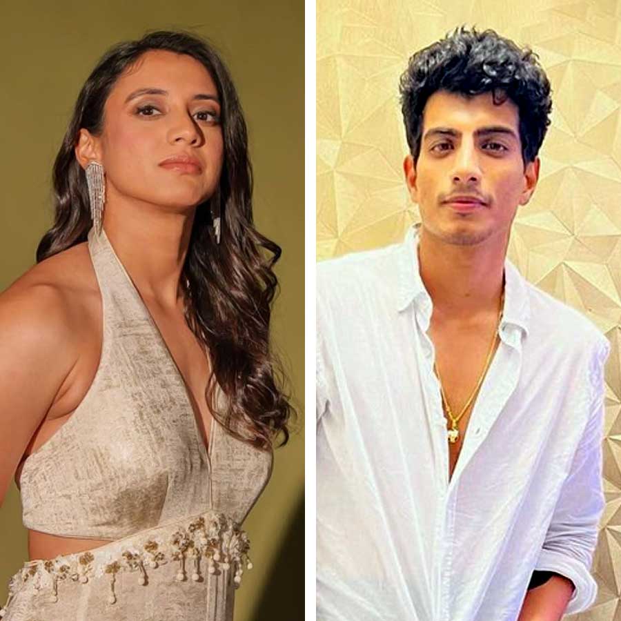 (বাঁ দিকে) স্মৃতি মন্ধানা, (ডান দিকে) পলাশ মুচ্ছল।