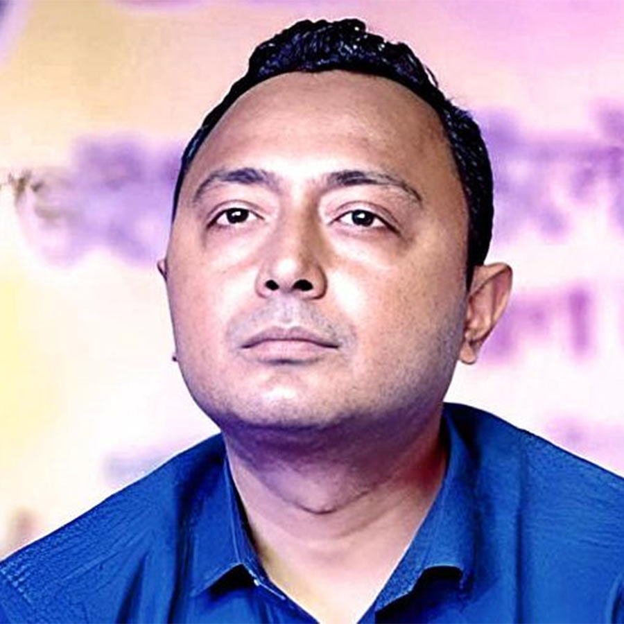 After being arrested, Debraj Chakraborty sat on the floor of the police station's lock-up and ate his dinner from a paper plate