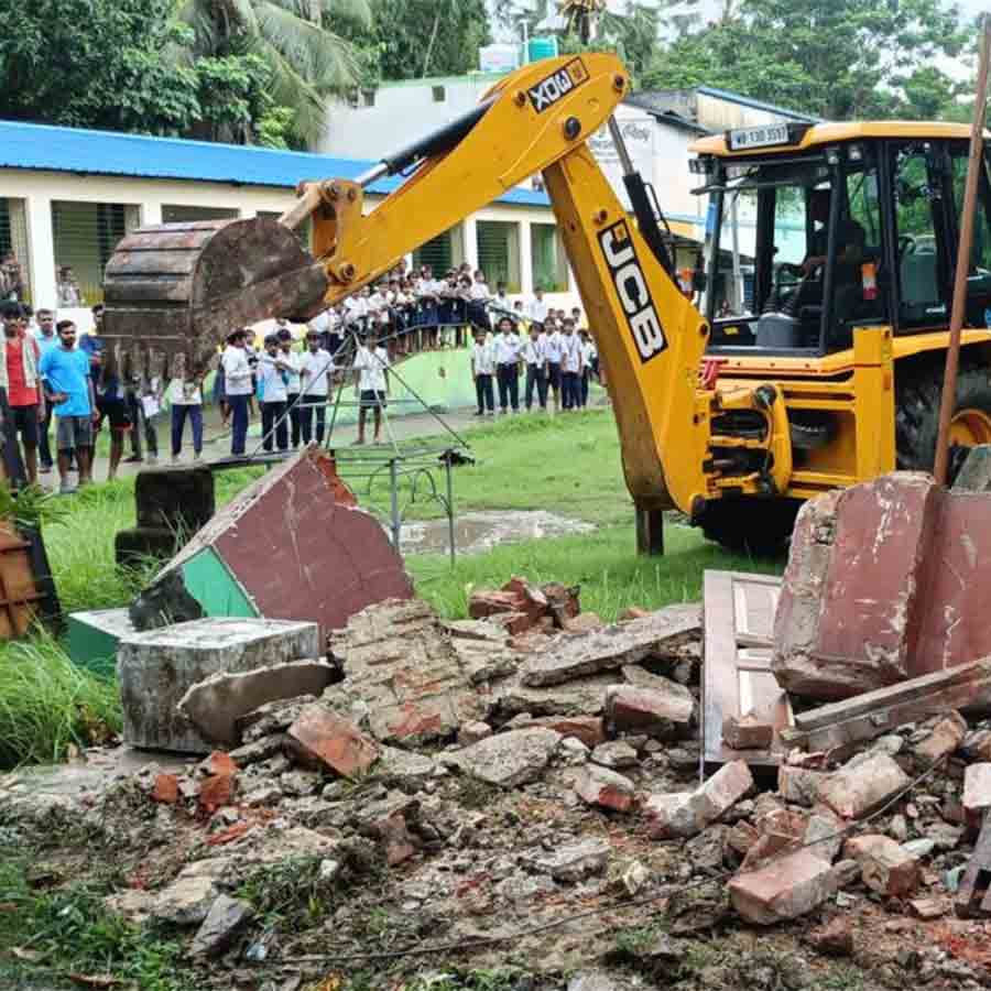 Uluberia administration demolished a TMC office built over Playground of a school
