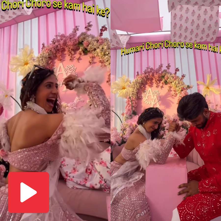 Video shows bride challenges groom in arm wrestling on the day of marriage