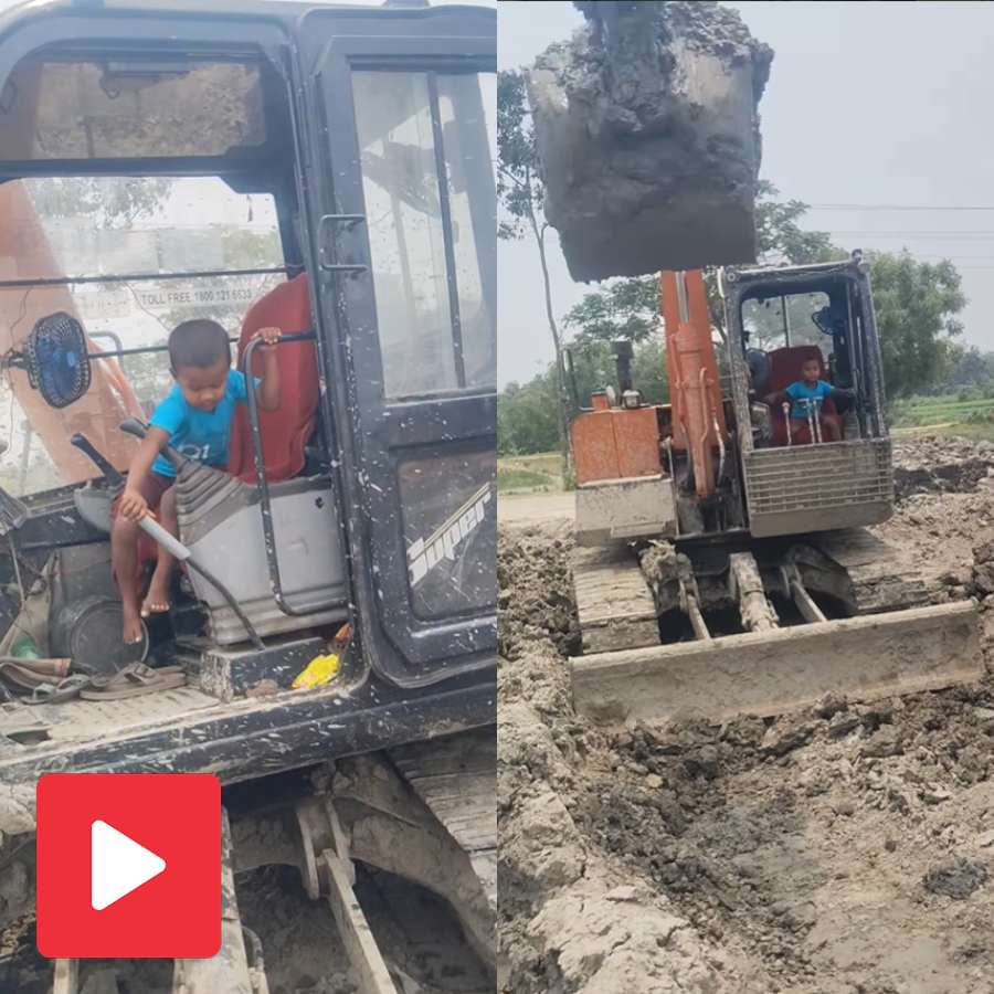 Video shows a boy operating a heavy-duty Poclain machine