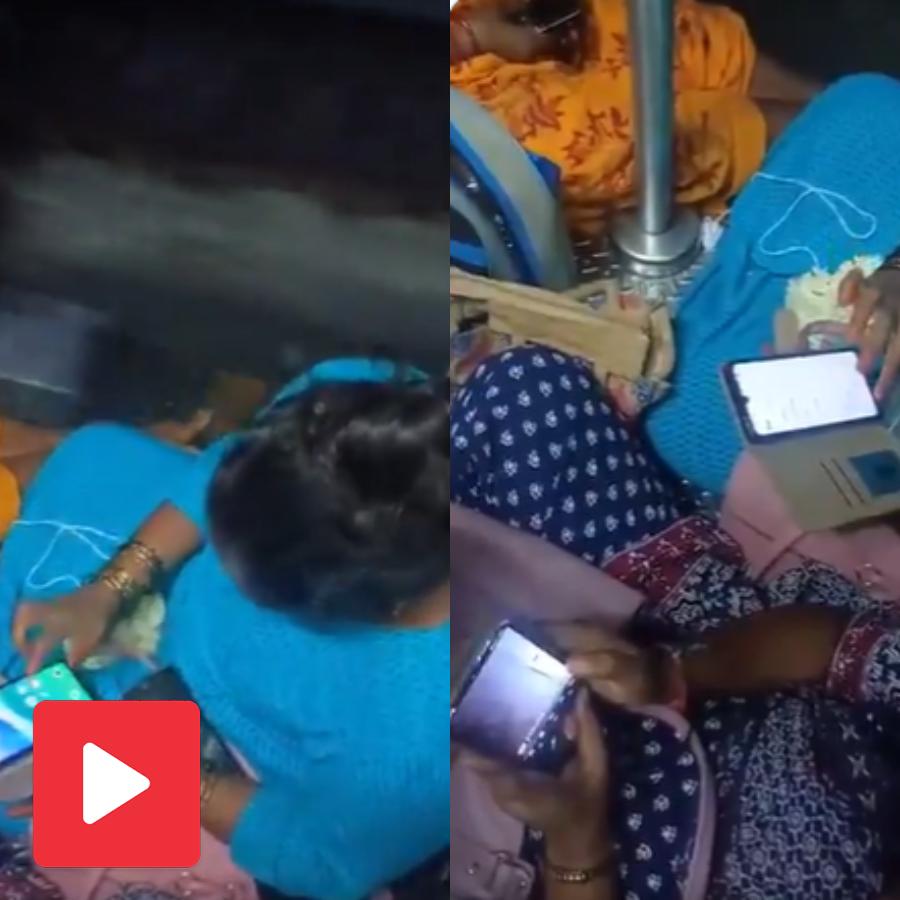 Video claims inside ladies compartment two women clicking picture of other two women without permission