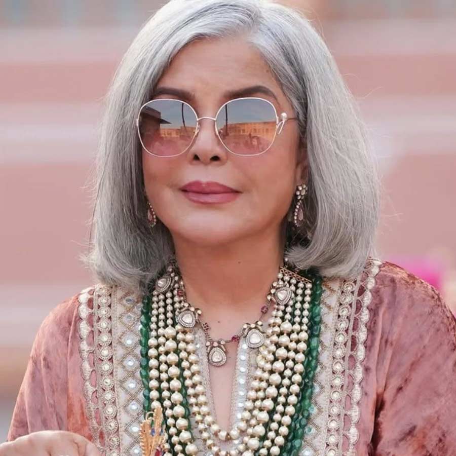 জ়িনত আমন কোন ধর্মে বিশ্বাসী?