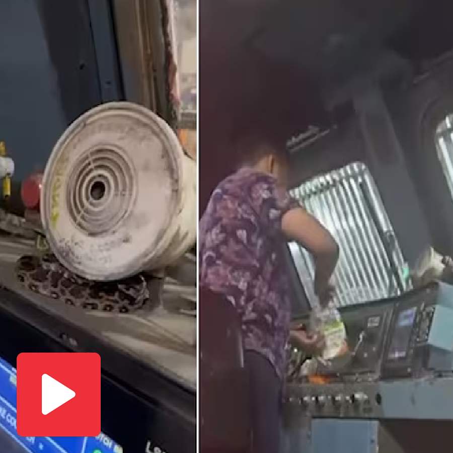 A video shows A baby python was found inside the engine of a train in Mumbai goes viral dgtl