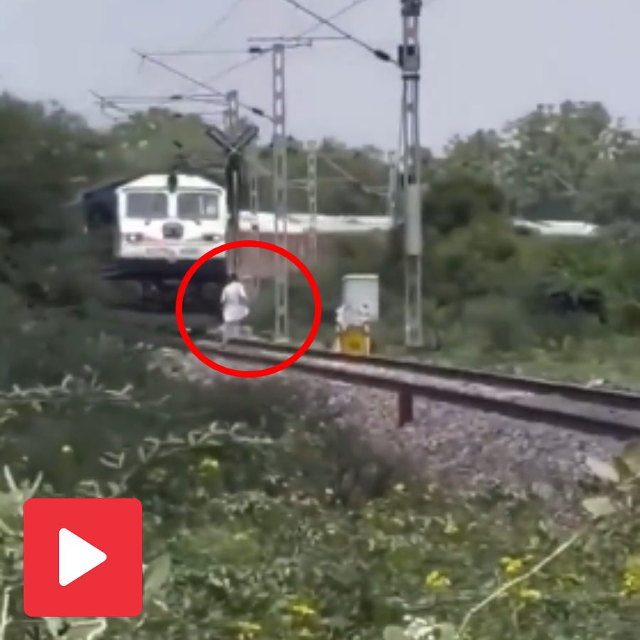 Video shows man hit by running train while passing track