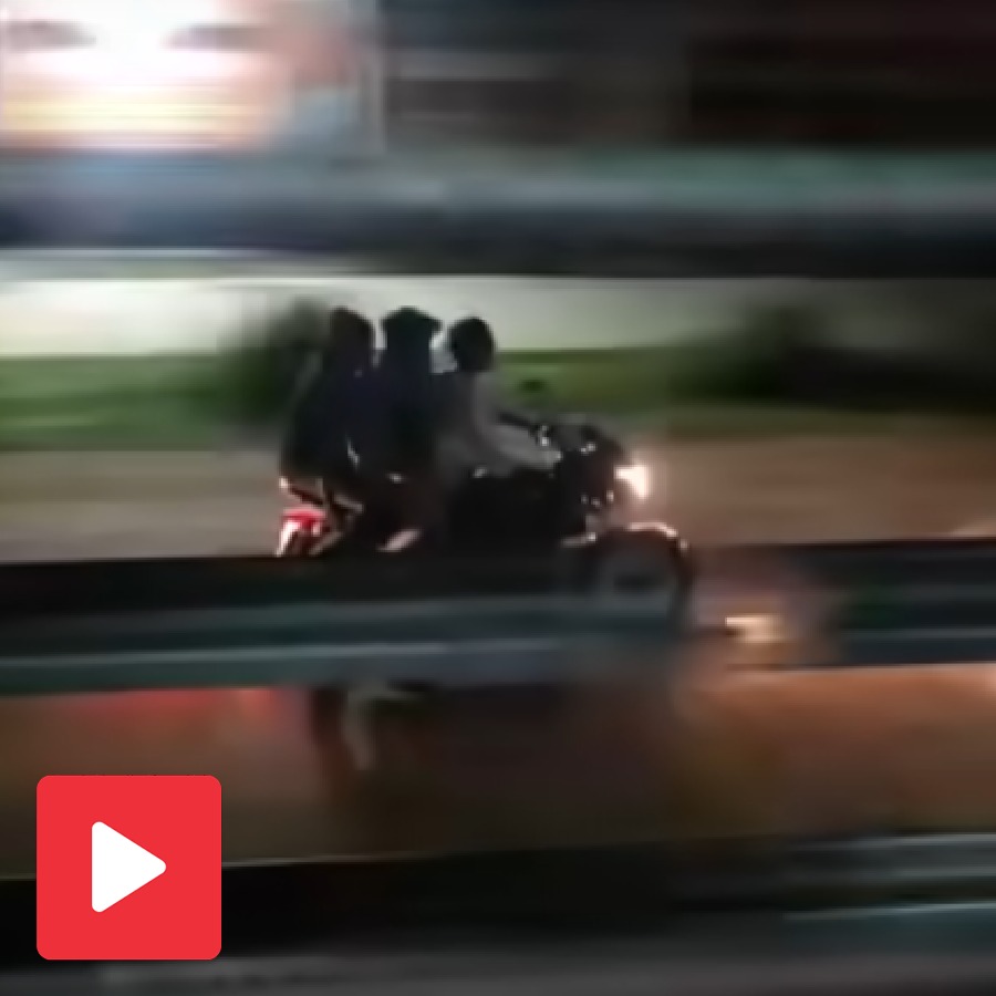 Video shows three young man racing against train with a bike, then something bizarre happens