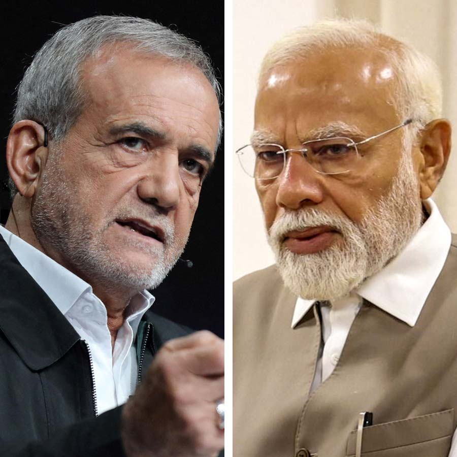 মাসুদ পেজ়েশকিয়ান (বাঁদিকে), (ডানদিকে) নরেন্দ্র মোদী