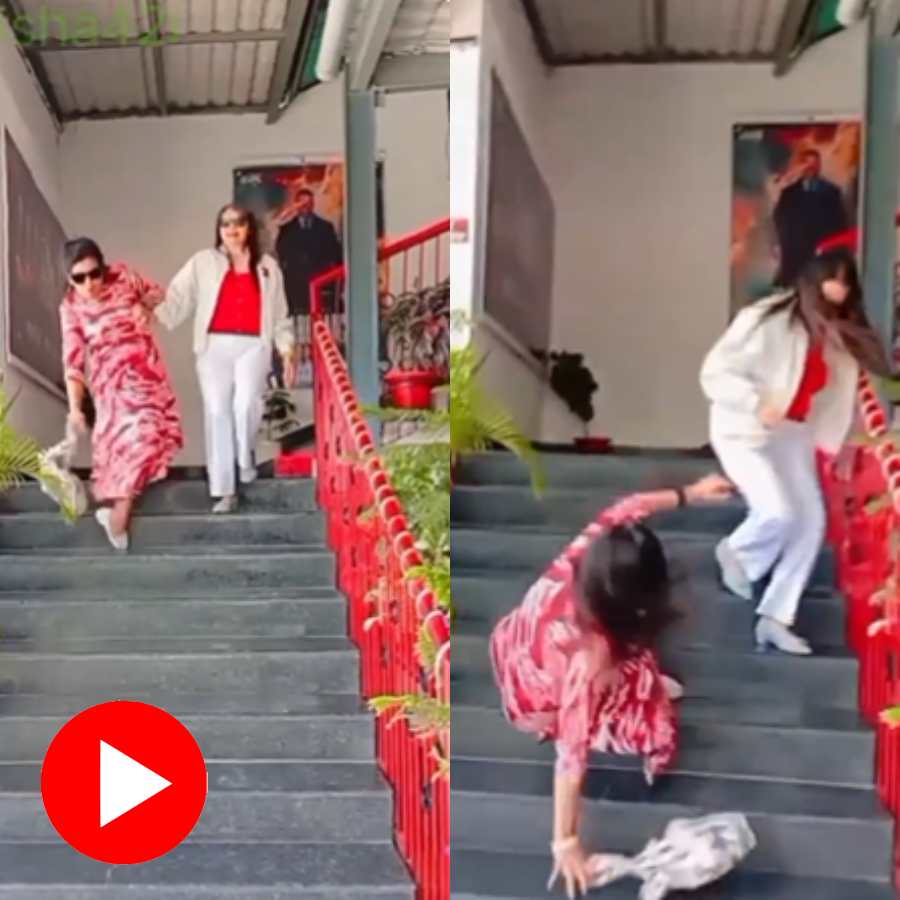 Video shows woman fall from staircase while shooting reel