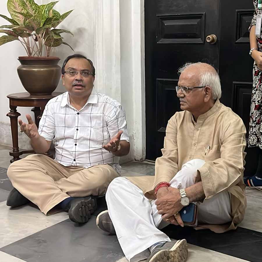 TMC MLAs Shobhandev Chatterjee and Kunal Ghosh protest in front of the Speaker’s room in West Bengal Assembly building