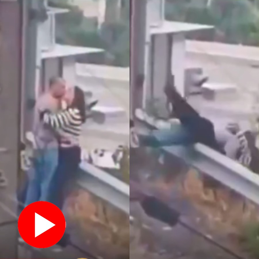 Video shows couple fall from railing while kissing