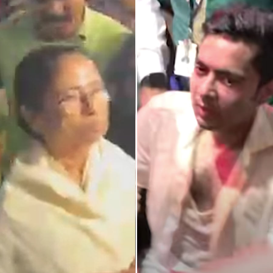 (বাঁ দিকে) মমতা বন্দ্যোপাধ্যায় এবং অভিষেক বন্দ্যোপাধ্যায় (ডান দিকে)।