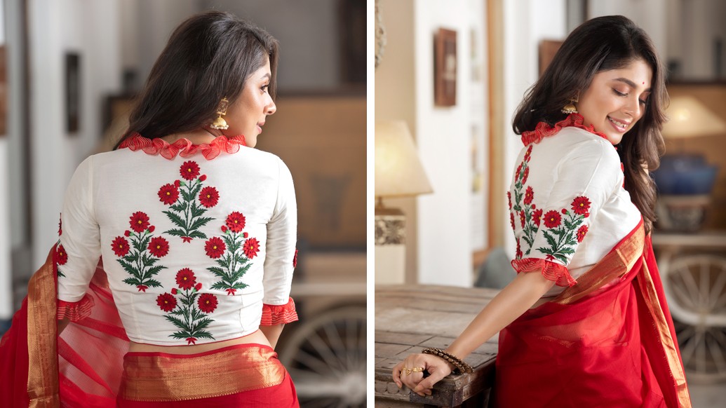 ব্লাউজের পিঠে বা শাড়ির আঁচলে সায়ন্তী ফুটিয়ে তুলছেন পুজোর নানা আচার অনুষ্ঠান। ষষ্ঠীতে যেমন দেবীর বোধনে পুজো শুরু। উমাকে স্বাগত জানানোর সেই শুভ মুহূর্তই ধরা রয়েছে সাদা ব্লাউজে, বাহারি এমব্রয়ডারিতে।