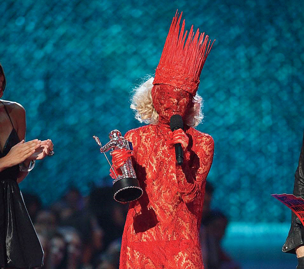 Who can forget Gaga’s VMA Tour de Force where she made the world take notice of her with her six costume changes! From a sheer red Alexander McQueen number with a Haus of Gaga crown with a veil that covered her face, Jean Paul Gaultier one-piece with boots to a lacy number with an elaborate headgear.