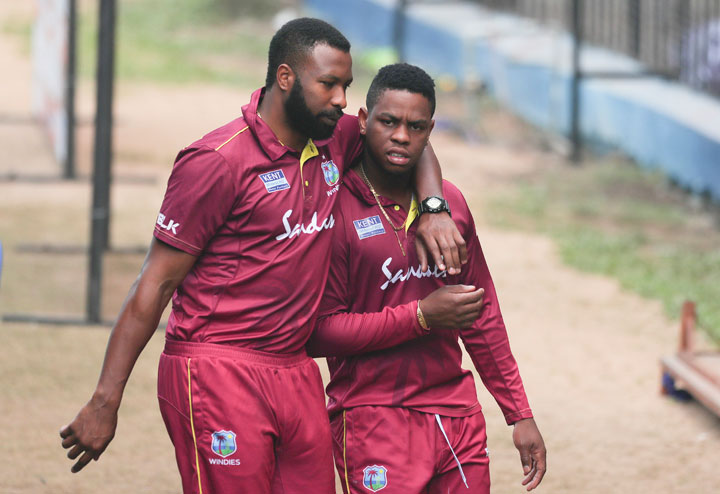 West Indies' Captain Kieron Pollard and Shimron Hetmyer attend a training session ahead of their third one-day cricket match against India, in Cuttack