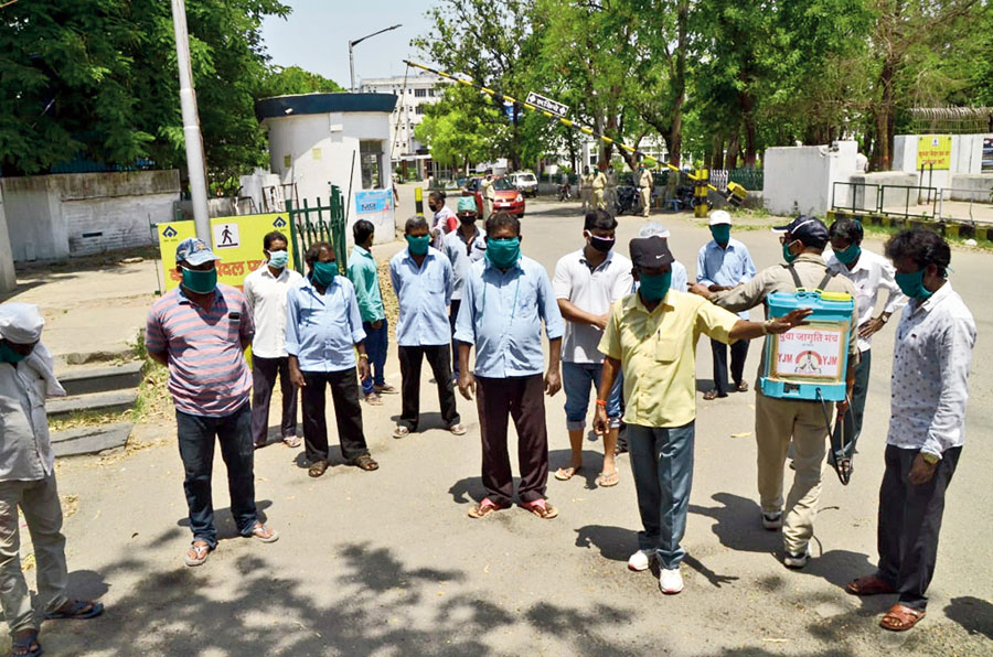 Sweepers of Bokaro General Hospital protest on Thursday.
