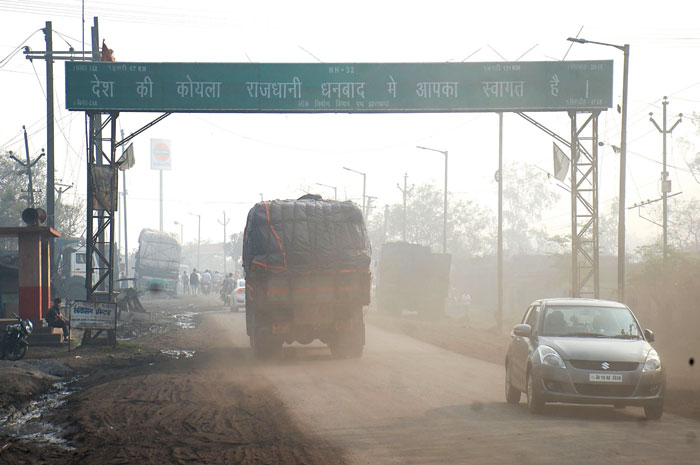 Every breath you take: A coal-laden truck leaves a dusty trail in Dhanbad on Friday