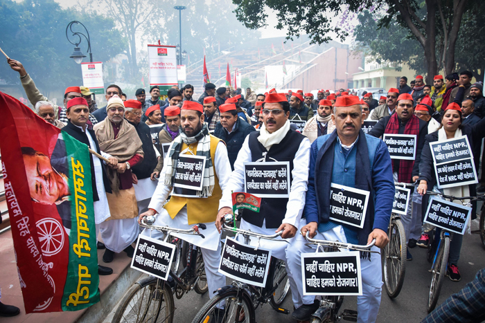 Samajwadi party leaders protest against the Citizenship (Amendment) Act and the National Register of Citizens (NRC) before a special session of Vidhan Sabha at Vidhan Bhawan in Lucknow