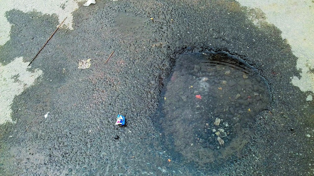 Pipe Leak Spawns Pothole Peril - Telegraph India