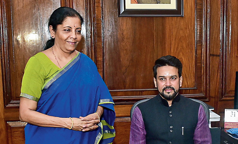 In the presence of Sitharaman, Anurag Singh Thakur takes charge as minister of state, finance and corporate affairs, on Friday.