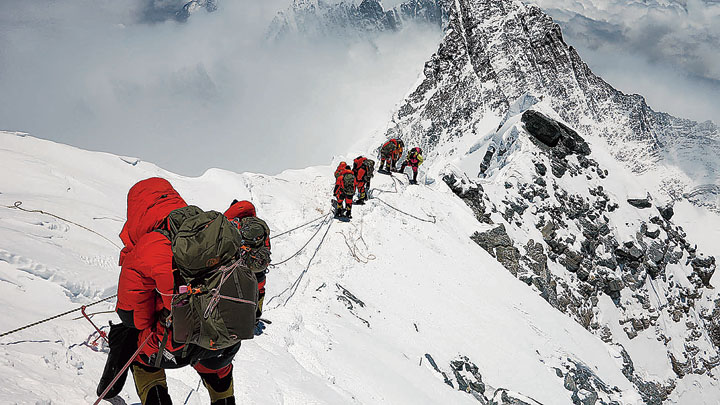 File picture of climbers negotiating a stretch en route to the peak of Mt Everest
