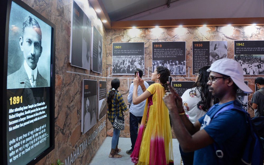 Visitors at an interactive digital exhibition on the 150th birth anniversary of Mahatma Gandhi in New Delhi. The anniversary was marked by praise and a fair degree of retrospective criticism. It will be interesting to see how the world celebrates the 150th anniversary of Lenin's birth