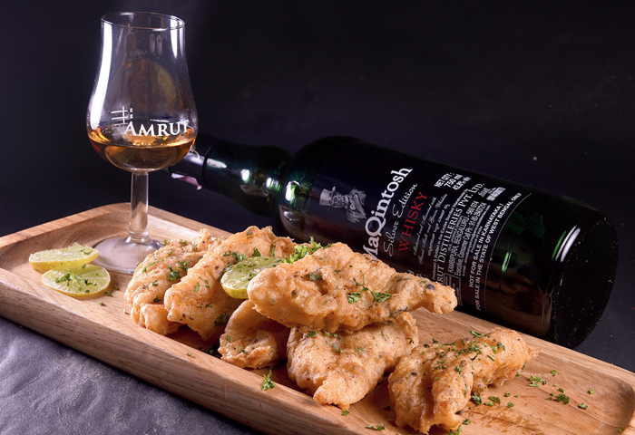 MaQintosh Batter Fish: The batter used for coating the fish is infused with MaQintosh, which makes the fish a lot more soft and succulent. You can pair it with any of the five spirits to take in distinct notes of each with the munch-worthy starter. Rs 379