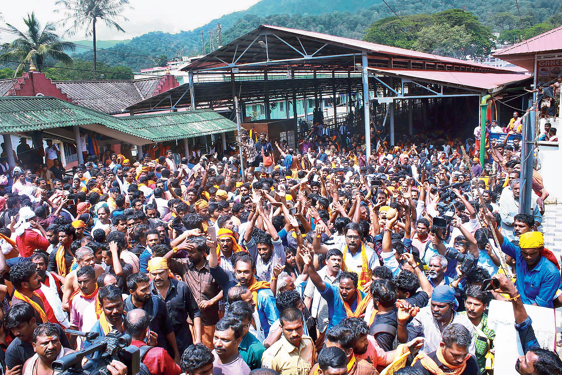 Protests break out as women arrive to offer prayers at Sabarimala temple on Sunday. The bench has by a 3:2 majority referred to a seven-judge bench the question whether women of childbearing age can enter the Sabarimala temple.


