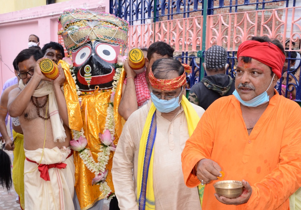 The idol of Jagannath is carried to the chariot at Dhansar Jagannath Mandir in Dhanbad