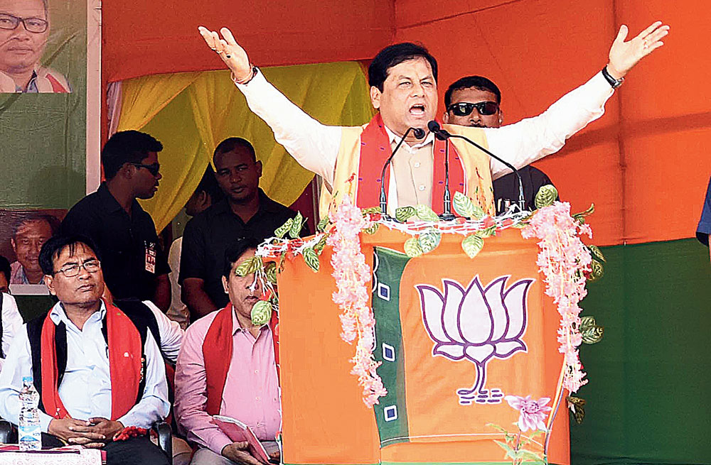 Chief minister Sarbananda Sonowal speaks at a rally for BJP candidate Horen Sing Bey at Bakaliaghat on Wednesday