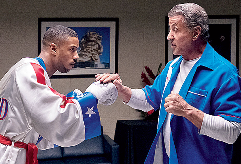 Michael B. Jordan and Sylvester Stallone in a scene from Creed II