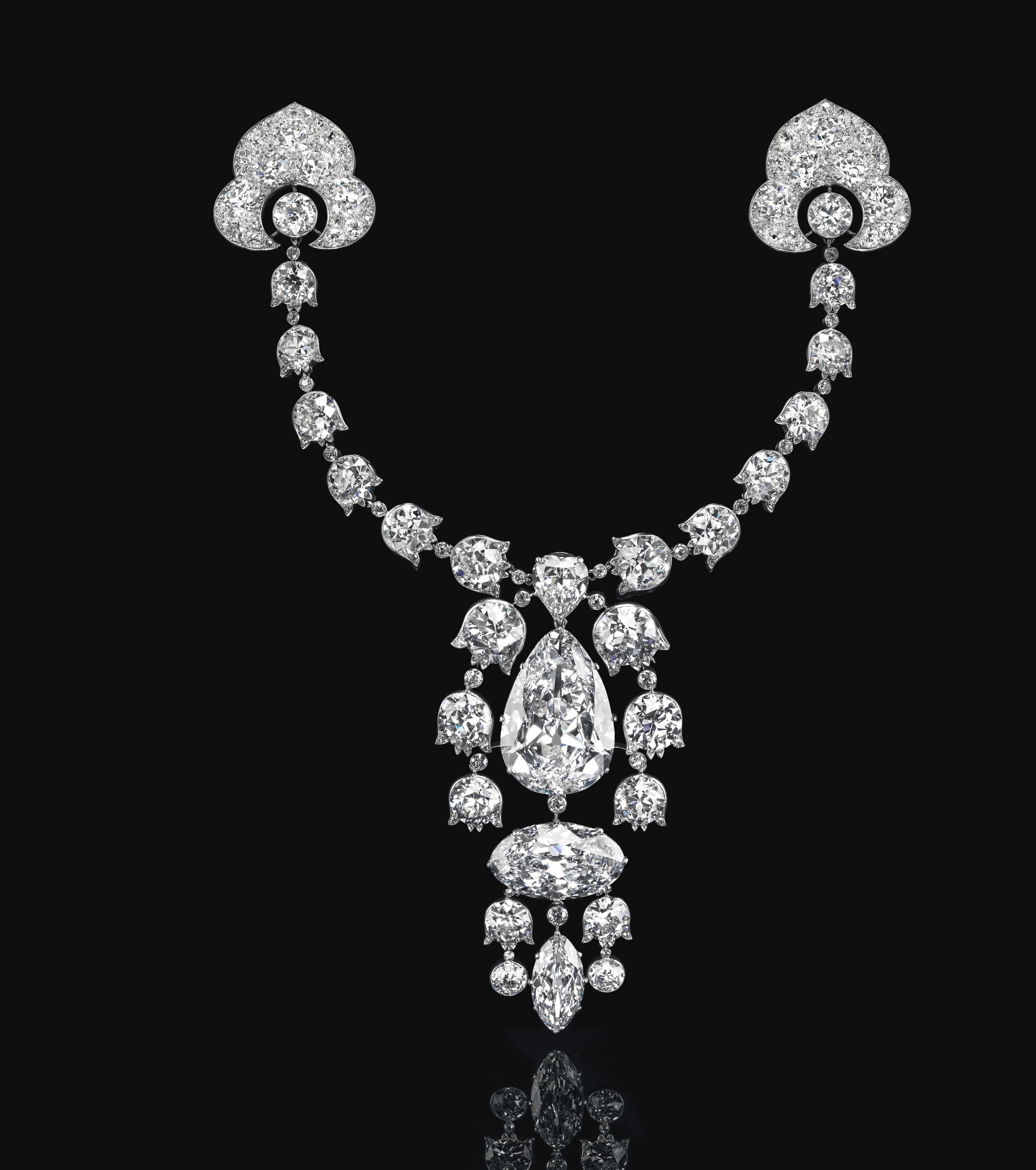 The ‘devant-de-corsage’ brooch was made to order by Cartier in 1912 for Solomon Barnato Joel, who made his fortune in the South African diamond mines. As a director of Barnato Brothers as well as of De Beers Consolidated Diamonds Mines, Joel was a major influence on the diamond and gold industries at the beginning of the 20th century. His fascination with diamonds remained constant throughout his long career, and for this brooch Joel provided Cartier with his four finest stones.

The brooch sold for $10,603,500 to a private collector in the room, creating a new world record.