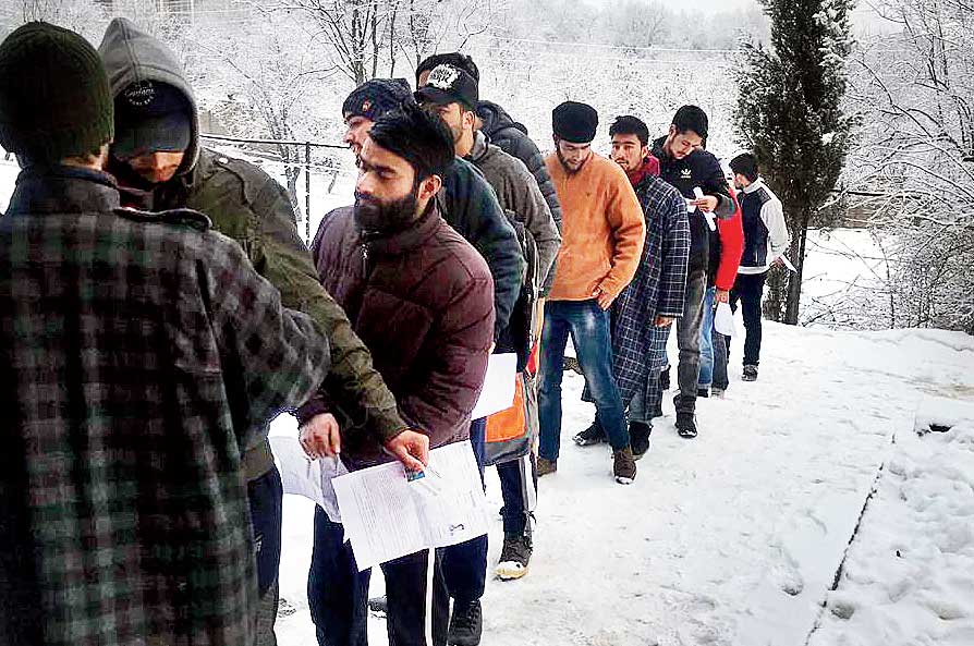 Students before a JEE-Main test centre in Kashmir on Thursday.