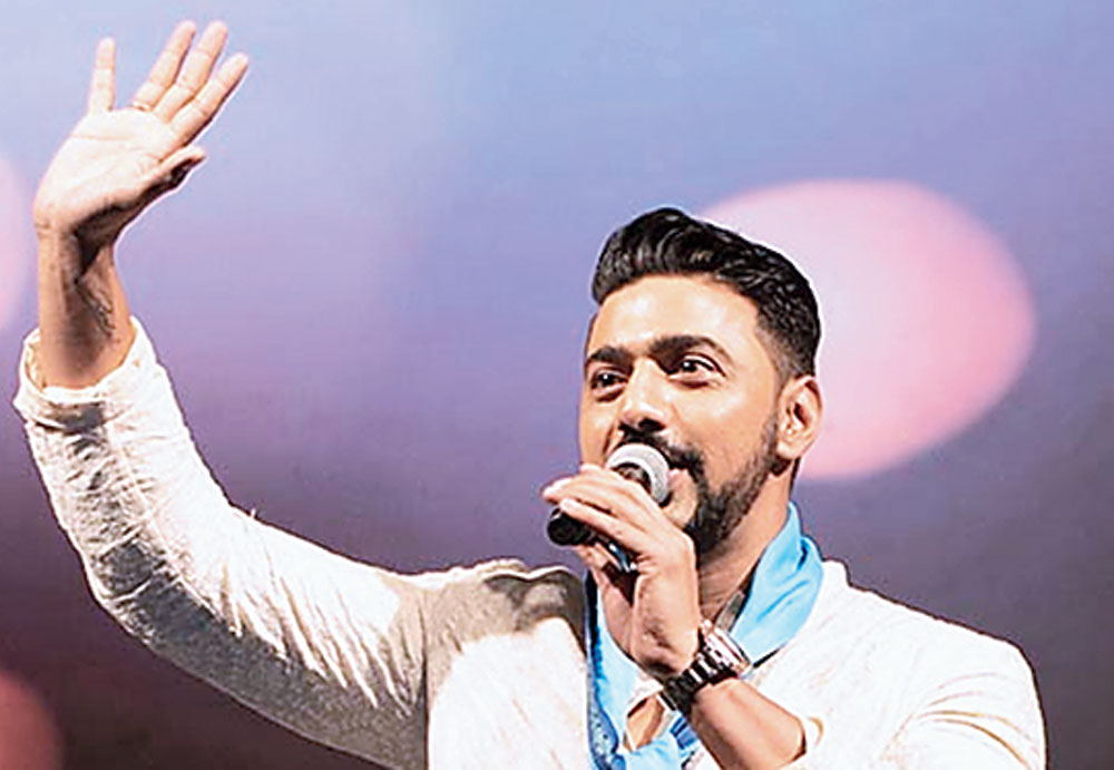 Actor Dev greets the audience.