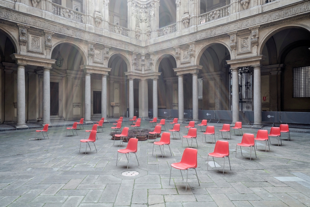 At Palazzo Marino in Milan, headquarters of the municipality of the city, chairs are placed outdoors and at a safe distance before a meeting, March 20, 2020