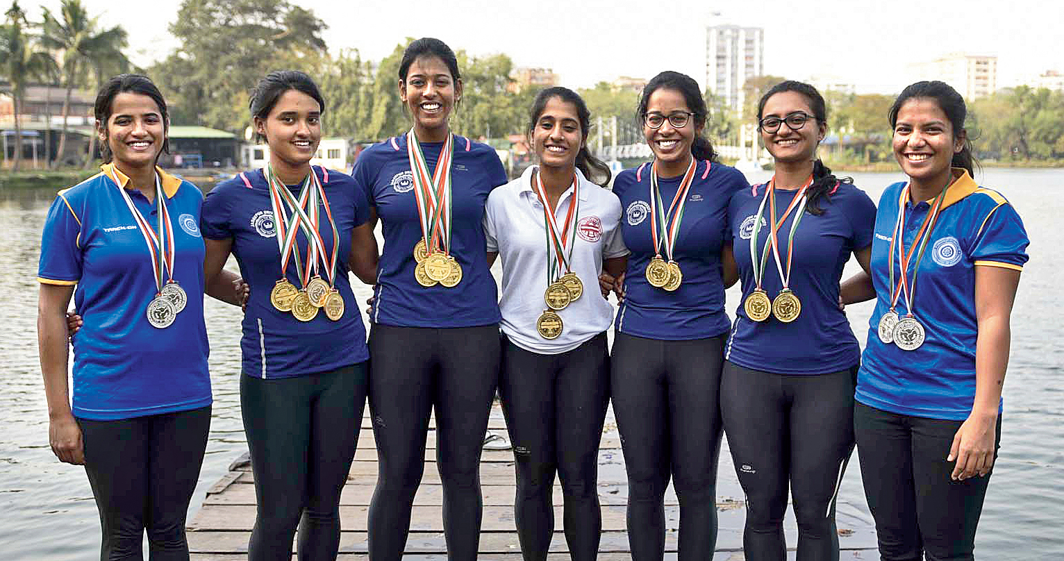 The team members strike a pose with the medals they brought home from Chandigarh