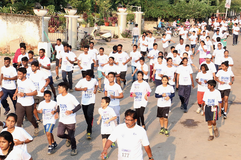 Save Earth mission: Volunteers take part in a marathon to create awareness against the use of plastic items in Berhampur on Tuesday