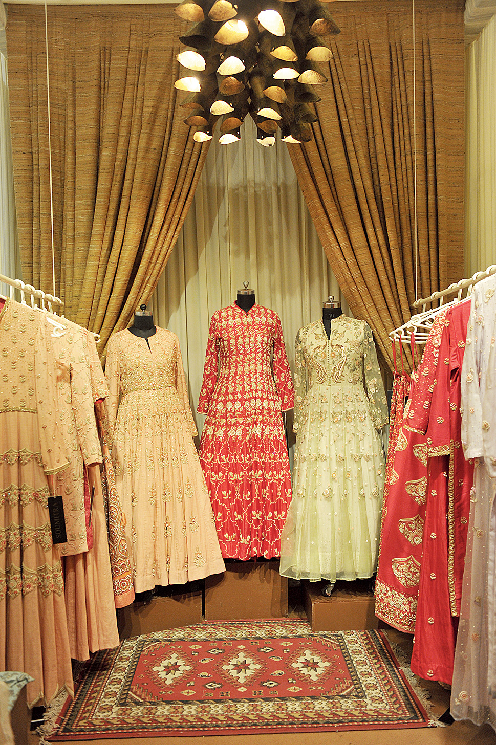 A brass chandelier gifted by artist Narayan Sinha to Soumitra Mondal for his new home’s dining table, added to his stall decor at Wedding Diaries. “My clothes were all ethnic and I wanted that royal touch. It blended well with the silk curtains,” said Soumitra.