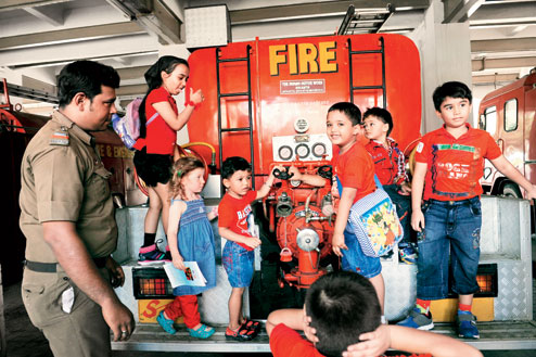 Class apart at fire station - Firefighters turn teachers for 26 kids ...