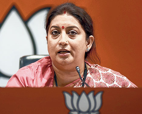 Smriti aims tax and hug gun at Rahul - Telegraph India