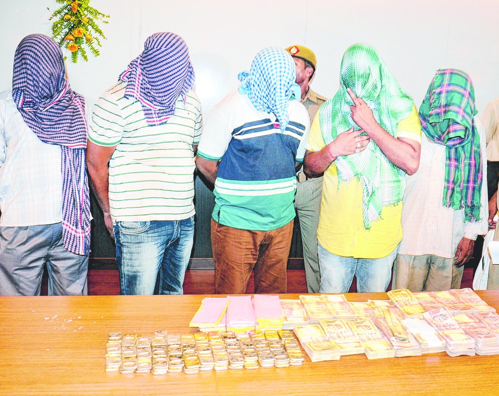 5 held for selling fake gold biscuits Telegraph India