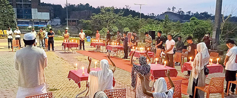 Students and faculty offer prayers at the University of Technology and Management, Meghalaya, in Ri Bhoi district on Easter Sunday. 