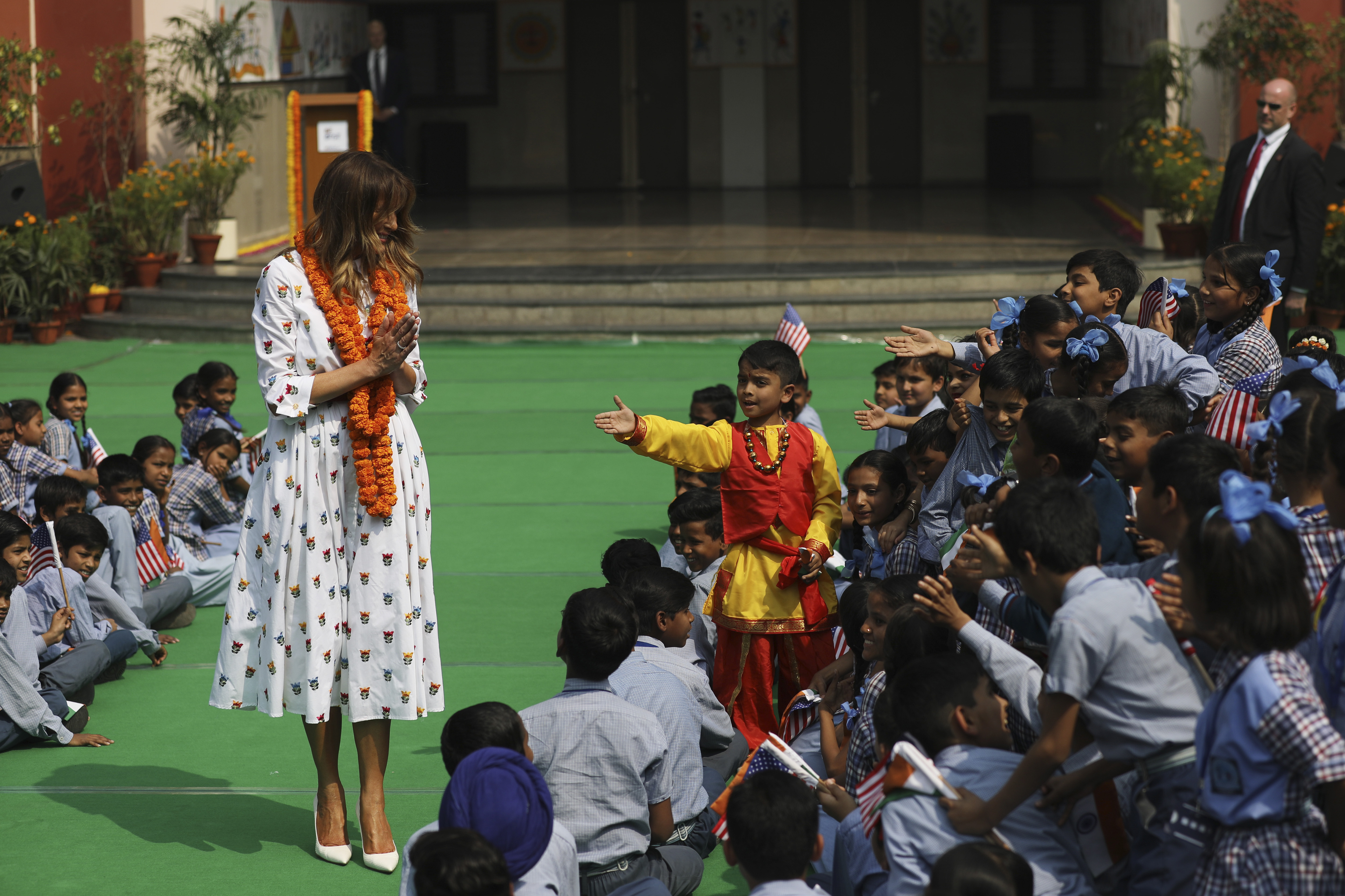 Melania Trump greets children at Sarvodaya Co-Educational Senior Secondary School in New Delhi, India on Tuesday