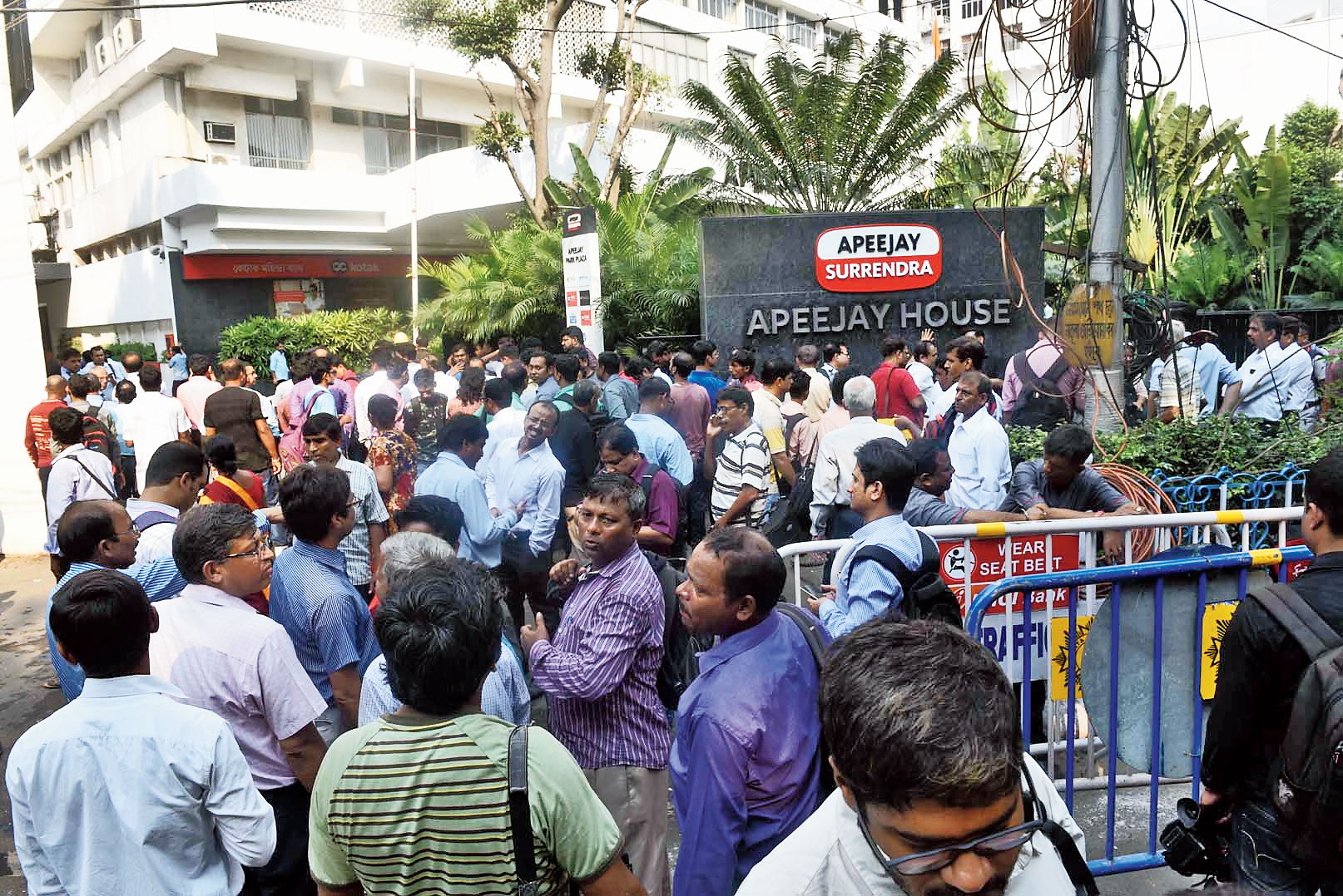 The crowd outside Apeejay House on Park Street at 1.45pm on Monday.
