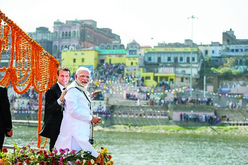 Modi and French President Macron walk hand in hand on ...