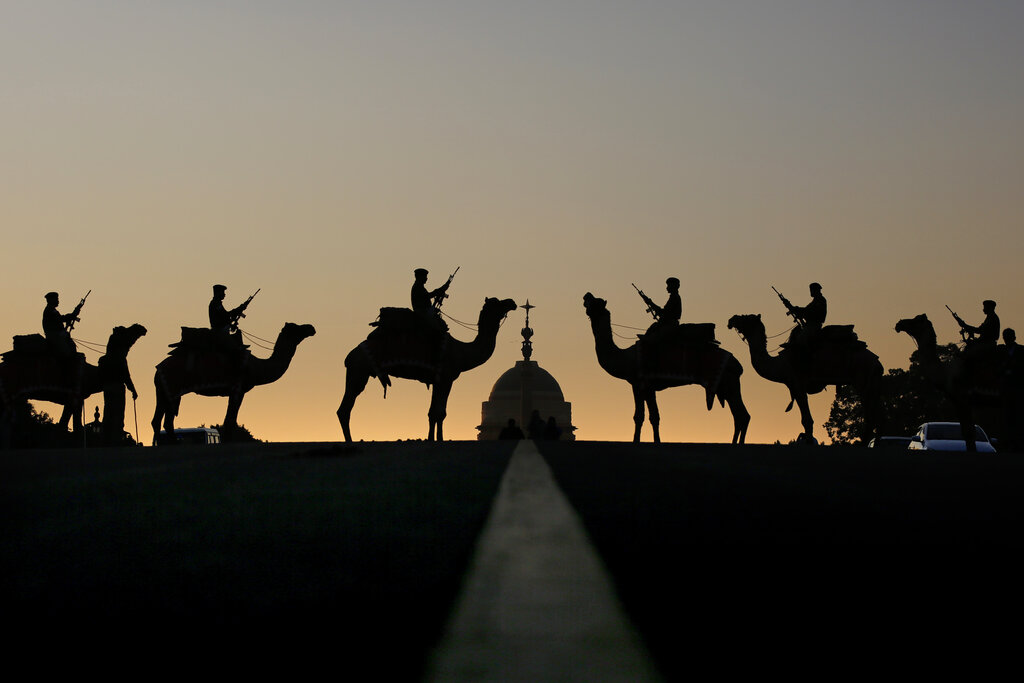 Camel mounted soldiers stand in formation during rehearsals for the upcoming Beating Retreat ceremony at Raisina hill which houses India's most important ministries and the presidential palace in in New Delhi