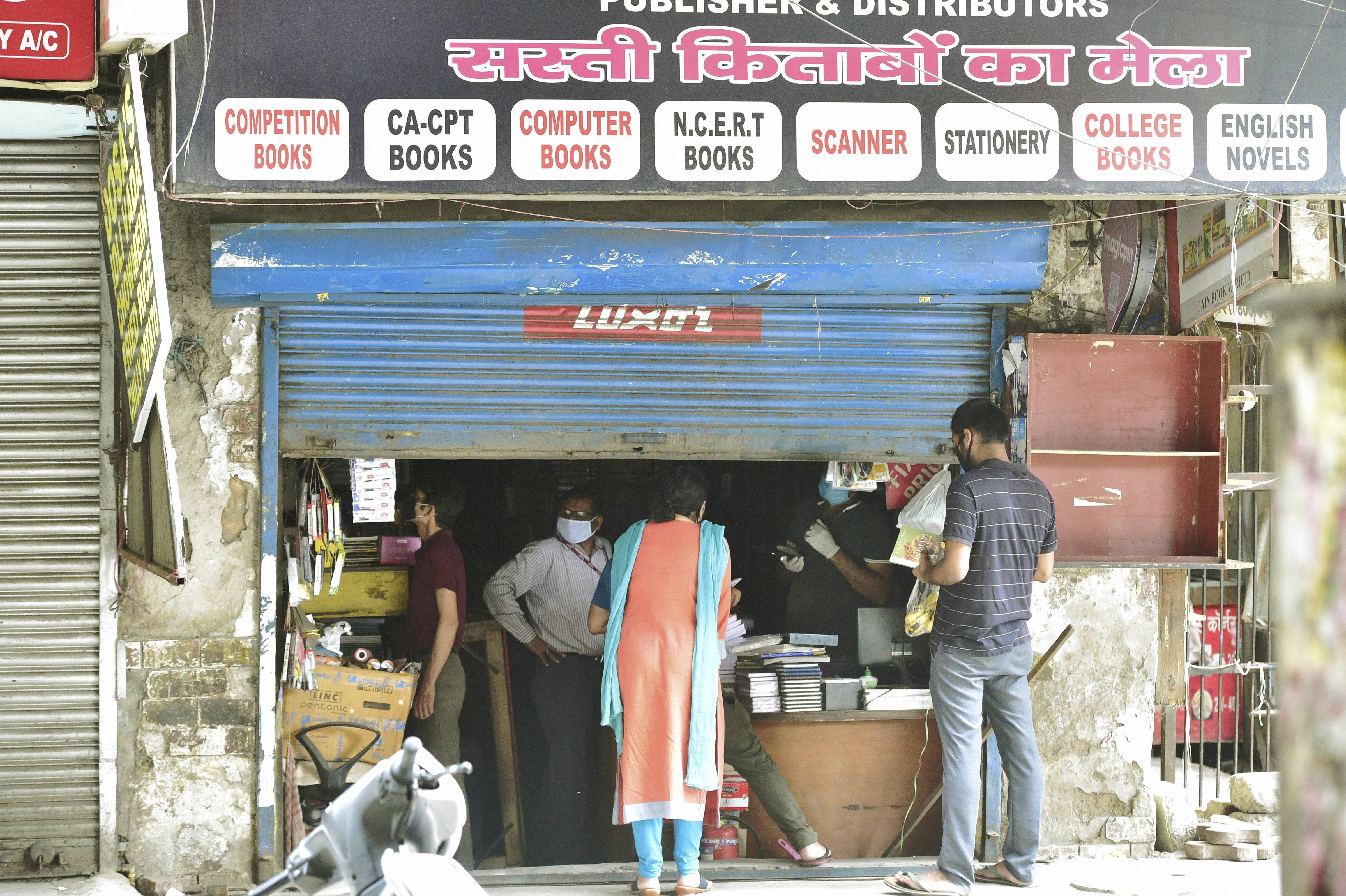 A partially opened book shop at Laxmi Nagar during ongoing nationwide lockdown to contain the novel coronavirus pendemic, in New Delhi, Tuesday, April 28, 2020.