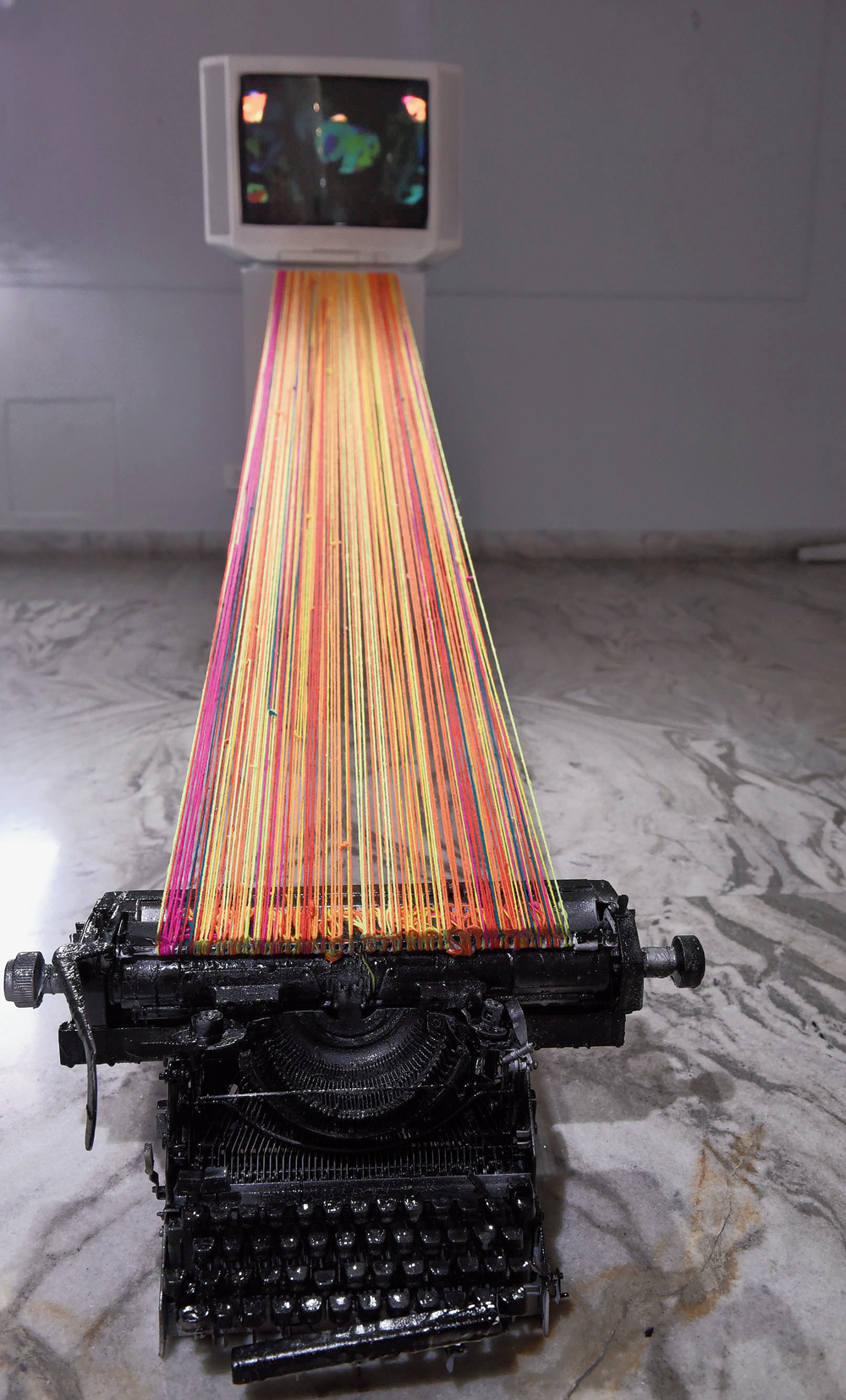 An installation capturing the artist’s favourite fictional character, Mukul of Sonar Kella, and his world through motion graphic and colourful threads