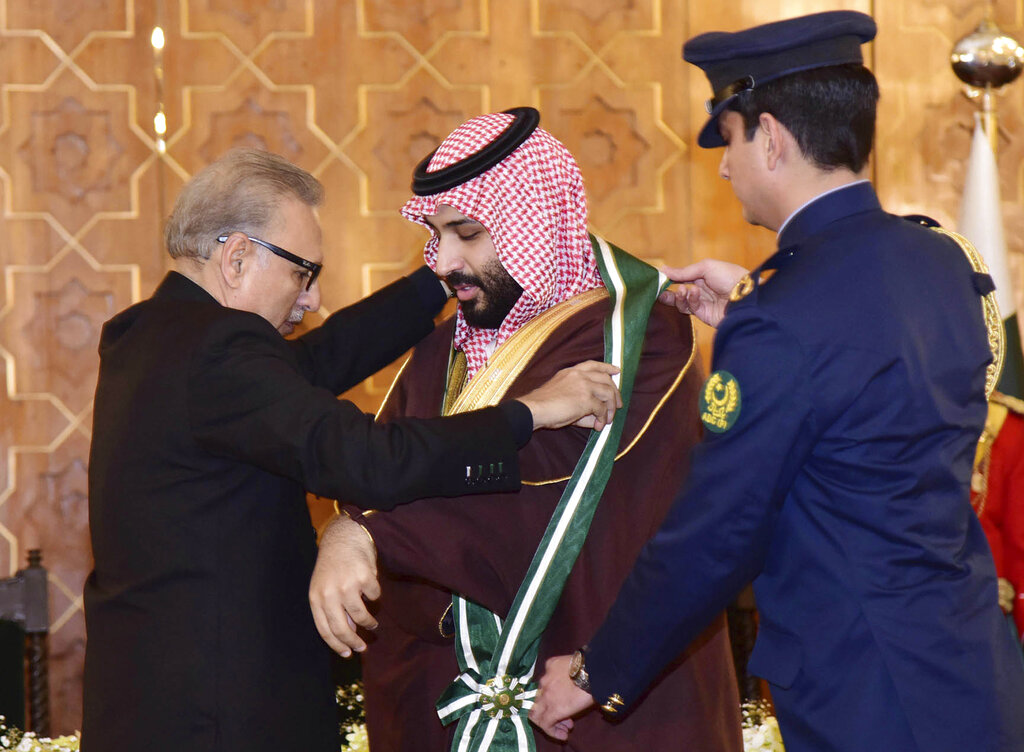 Pakistani President Arif Alvi (left) confers Pakistan's highest civil award Nishan-e-Pakistan to Mohammed bin Salman in Islamabad on Monday.