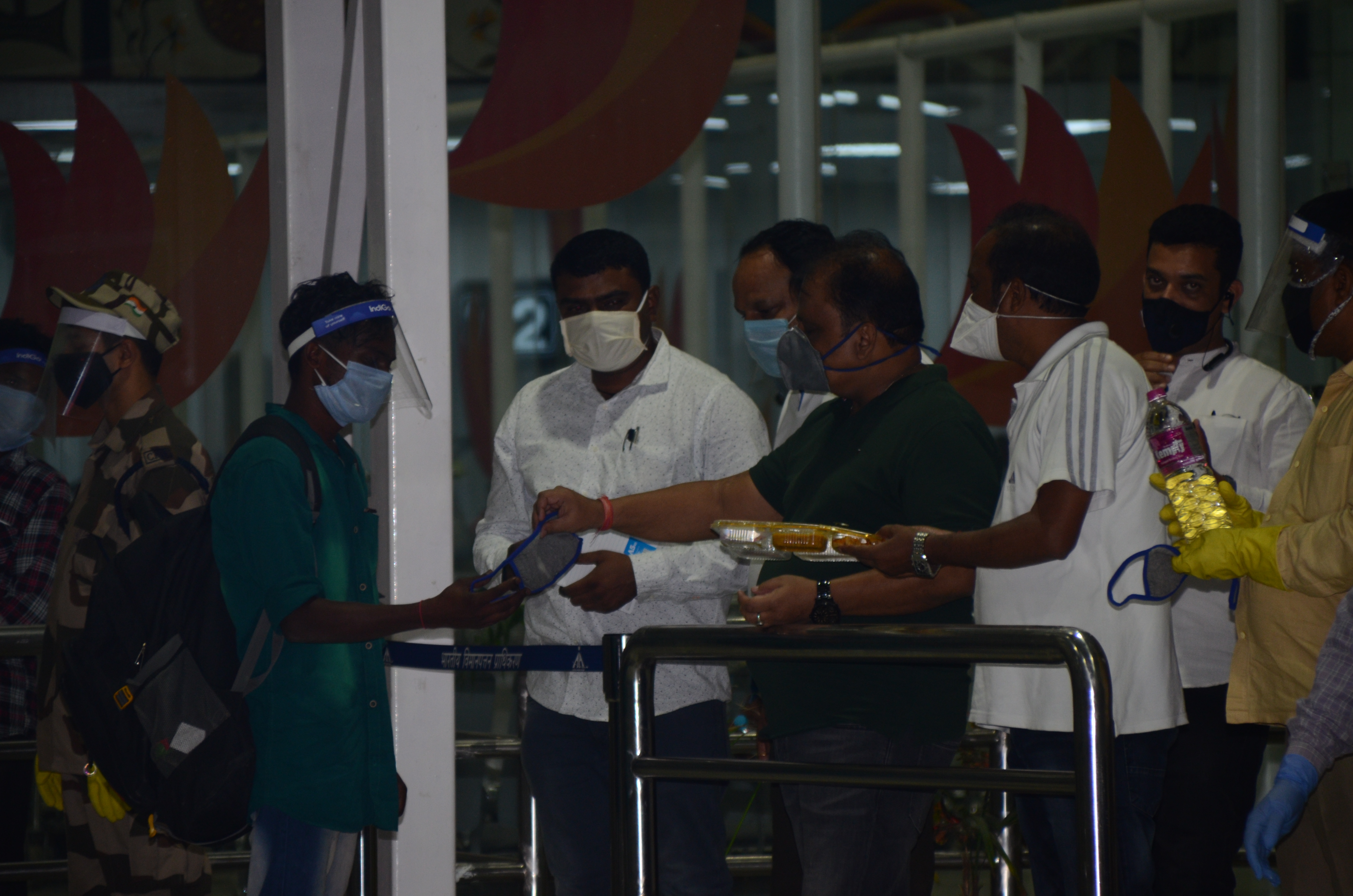 Migrant laboures at Birsa Munda Airport in Ranchi after their arrival from Andamans on May 30. 